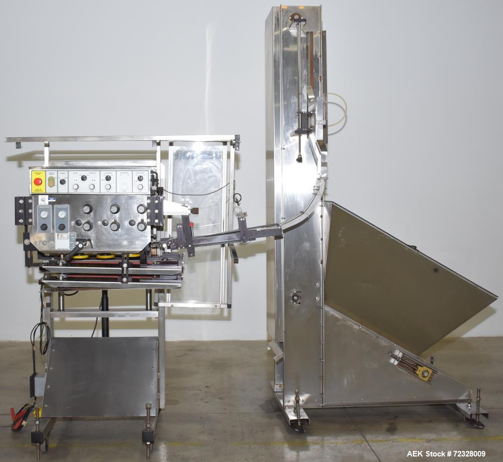 Used E-Pak Automatic Inline Quill Capper with Integrated Cap Elevator/Sorter.